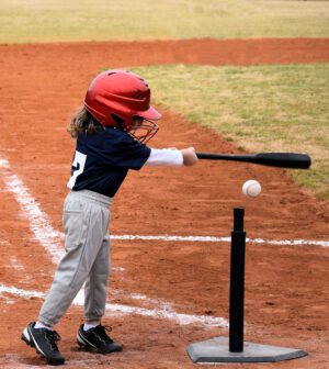 Baseball Kid Up At Bat Making A Hit